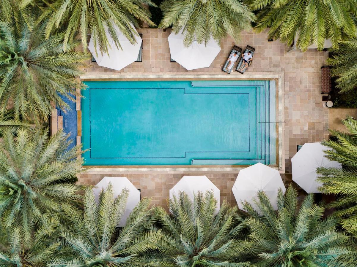 Jumeirah Dar Al Masyaf Dubai Luaran gambar Aerial view of the pool at the Four Seasons Hotel